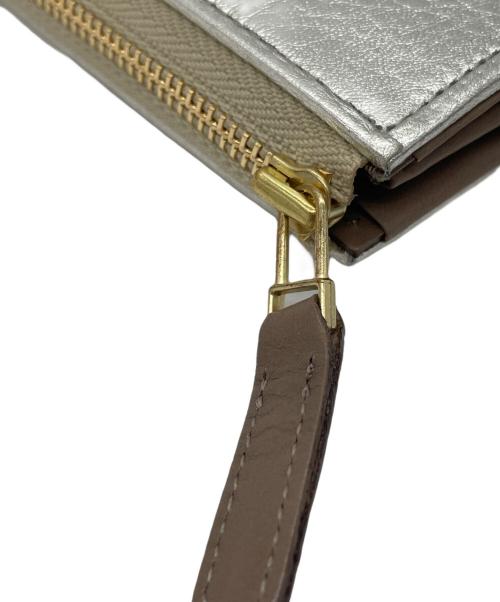 synphie（シンフェイエ）synphie (シンフェイエ) EAR (イア) ミニウォレット シルバーの古着・服飾アイテム