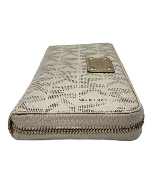 MICHAEL KORS（マイケル・コース）MICHAEL KORS (マイケルコース) ラウンドファスナー財布 アイボリーの古着・服飾アイテム