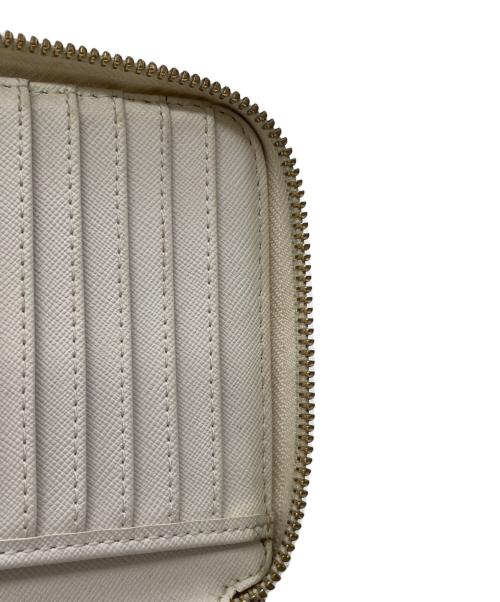 MICHAEL KORS（マイケル・コース）MICHAEL KORS (マイケルコース) ラウンドファスナー財布 アイボリーの古着・服飾アイテム