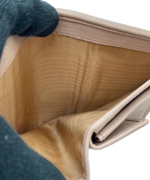 MIU MIU（ミュウミュウ）MIU MIU (ミュウミュウ) 2つ折り財布 ピンクの古着・服飾アイテム