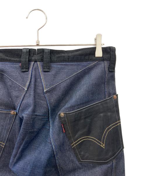 eYe COMME des GARCONS JUNYAWATANABE MAN（アイ コム デ ギャルソン ジュンヤ ワタナベ マン）eYe COMME des GARCONS JUNYAWATANABE MAN (アイ コム デ ギャルソン ジュンヤ ワタナベ マン) LEVI'S (リーバイス) 再構築デニムパンツ インディゴ×ブラック サイズ:XSの古着・服飾アイテム