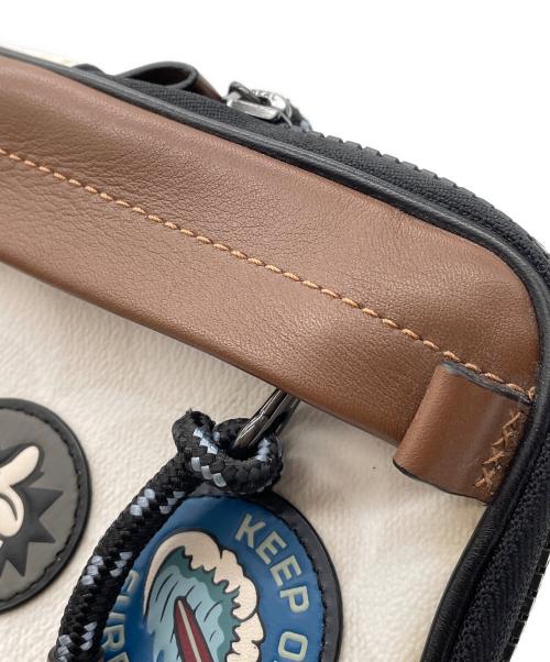 DISNEY（ディズニー）DISNEY (ディズニー) COACH (コーチ) ポシェットの古着・服飾アイテム