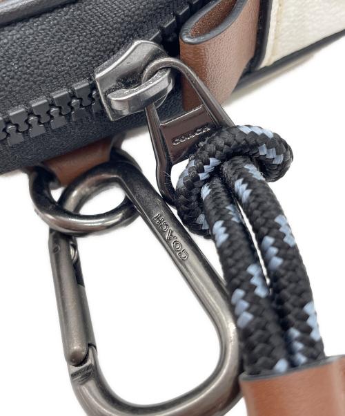 DISNEY（ディズニー）DISNEY (ディズニー) COACH (コーチ) ポシェットの古着・服飾アイテム