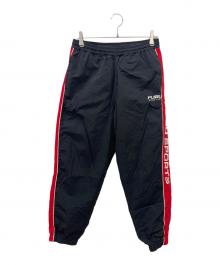 FUBU（フブ）の古着「ナイロンパンツ」｜レッド×ブラック