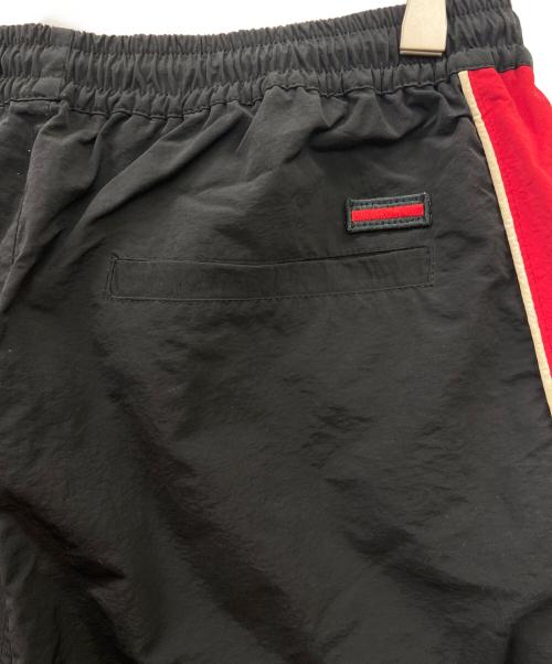 FUBU（フブ）FUBU (フブ) ナイロンパンツ レッド×ブラック サイズ:ｌの古着・服飾アイテム