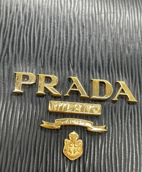 PRADA（プラダ）PRADA (プラダ) PRADA　サフィアーノ　長財布 ブラック×レッドの古着・服飾アイテム
