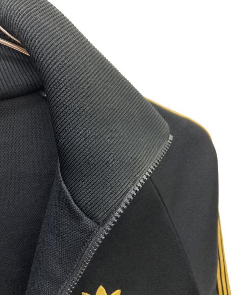 adidas（アディダス）adidas (アディダス) トラックジャケット ブラック×ゴールド サイズ:90-4の古着・服飾アイテム