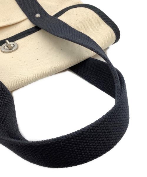 信三郎鞄（シンザブロウカバン）信三郎鞄 (シンザブロウカバン) 鉄腕アトム (テツワンアトム) 信三郎鞄　鉄腕アトム　ハンドバッグ ベージュ×ブラックの古着・服飾アイテム