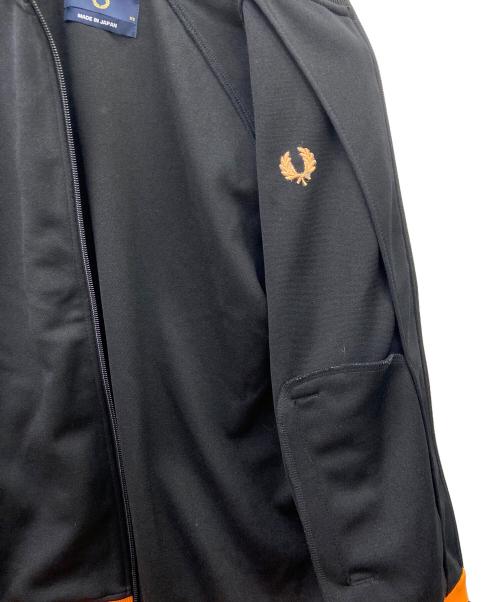 FRED PERRY（フレッドペリー）FRED PERRY (フレッドペリー) トラックジャケット ブラック×オレンジ サイズ:XSの古着・服飾アイテム