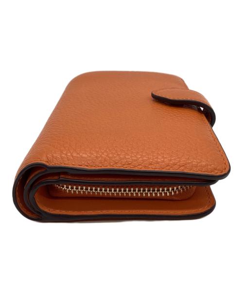 Kate Spade（ケイトスペード）Kate Spade (ケイトスペード) Kate Spade　レナ ミディアム コンパクト バイフォールド ウォレット オレンジの古着・服飾アイテム