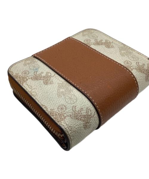 COACH（コーチ）COACH (コーチ) COACH 　ビルフォールド 　ウォレット・ホース アンド キャリッジ プリント 　2つ折り財布 ホワイト×ブラウンの古着・服飾アイテム
