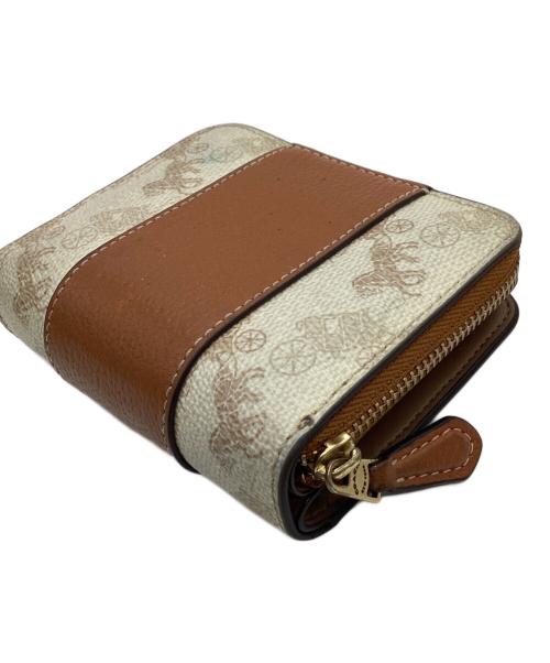 COACH（コーチ）COACH (コーチ) COACH 　ビルフォールド 　ウォレット・ホース アンド キャリッジ プリント 　2つ折り財布 ホワイト×ブラウンの古着・服飾アイテム