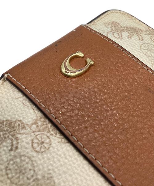 COACH（コーチ）COACH (コーチ) COACH 　ビルフォールド 　ウォレット・ホース アンド キャリッジ プリント 　2つ折り財布 ホワイト×ブラウンの古着・服飾アイテム