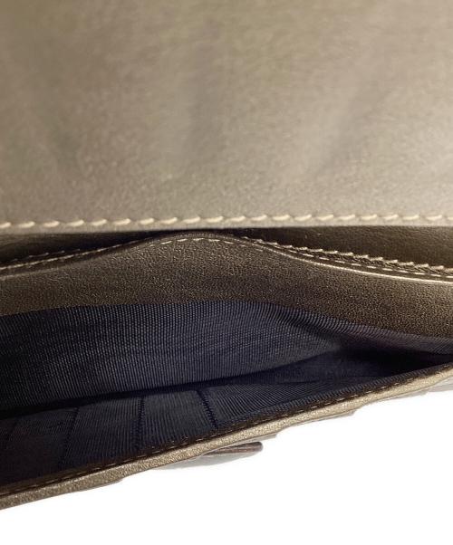 GUCCI（グッチ）GUCCI (グッチ) GUCCI　GGインプリメ　長財布 ゴールドの古着・服飾アイテム