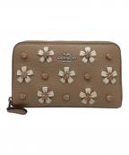 COACHコーチ）の古着「COACH　トープレザー ミディアム ID ジップウォレット　2つ折り財布」｜ベージュ×ホワイト