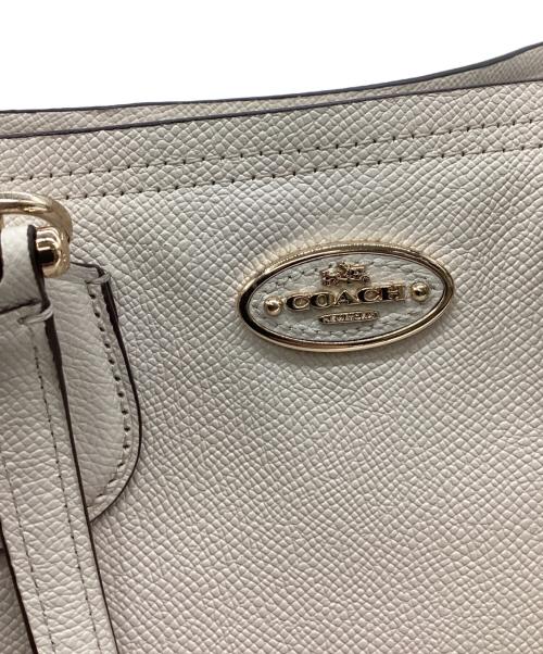 COACH（コーチ）COACH (コーチ) COACH 　スモール キット キャリーオール 　2WAYバッグ アイボリーの古着・服飾アイテム