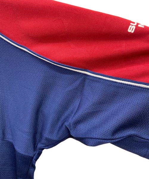 TOSTEM（トステム）TOSTEM (トステム) 鹿島アントラーズ　サッカーユニフォーム ボルドー×ネイビー サイズ:ｌの古着・服飾アイテム