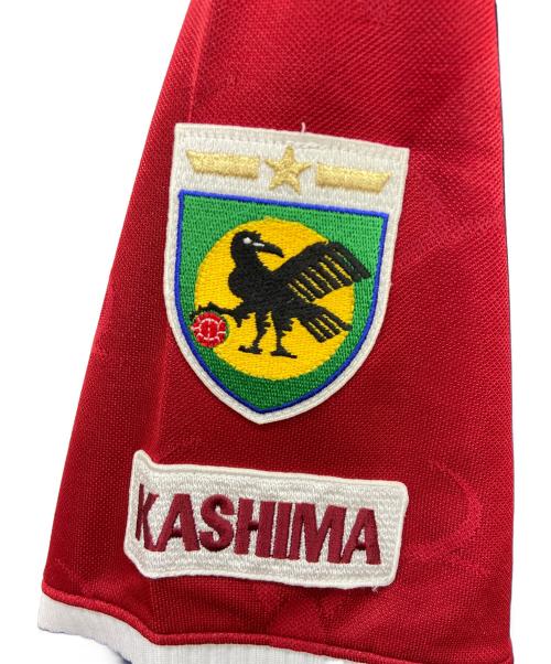 TOSTEM（トステム）TOSTEM (トステム) 鹿島アントラーズ　サッカーユニフォーム ボルドー×ネイビー サイズ:ｌの古着・服飾アイテム