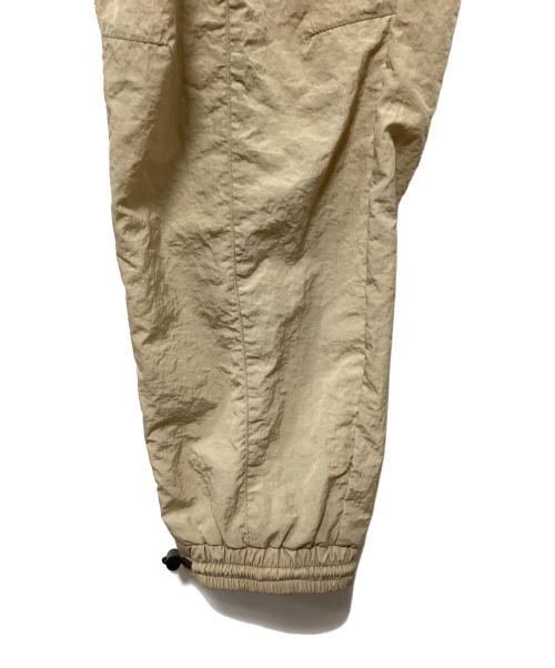 Calvin Klein Jeans（カルバンクラインジーンズ）Calvin Klein Jeans (カルバンクラインジーンズ) ナイロンパンツ ベージュ サイズ:Sの古着・服飾アイテム