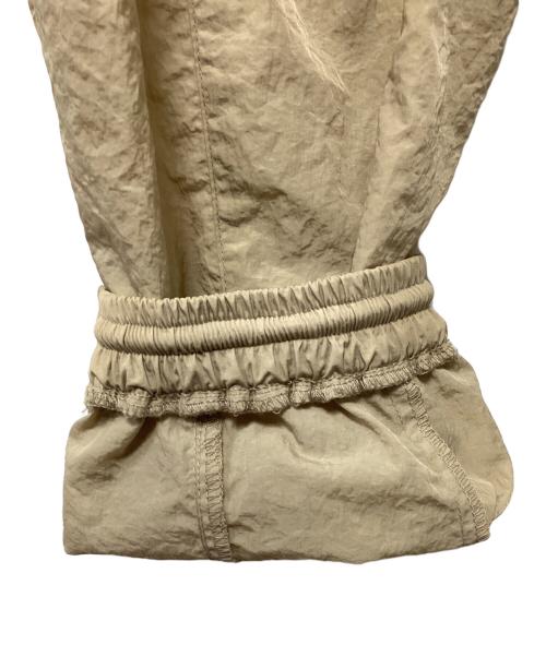 Calvin Klein Jeans（カルバンクラインジーンズ）Calvin Klein Jeans (カルバンクラインジーンズ) ナイロンパンツ ベージュ サイズ:Sの古着・服飾アイテム