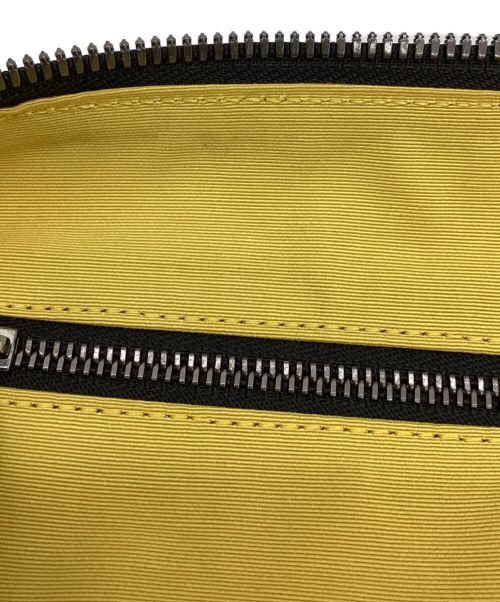 ROGER DUBUIS（ロジェデュブイ）ROGER DUBUIS (ロジェデュブイ) トラベルポーチ ブラック×イエローの古着・服飾アイテム