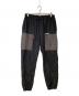 X-LARGE（エクストララージ）の古着「トラックパンツ」｜ブラック