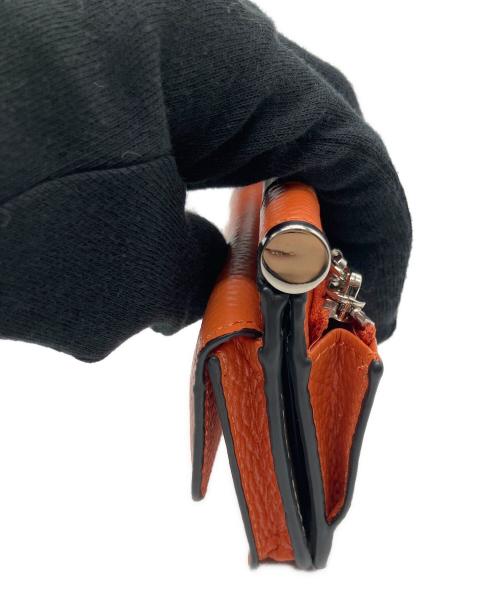 EAR（イア）ear (イア) 2つ折り財布 オレンジ 未使用品の古着・服飾アイテム