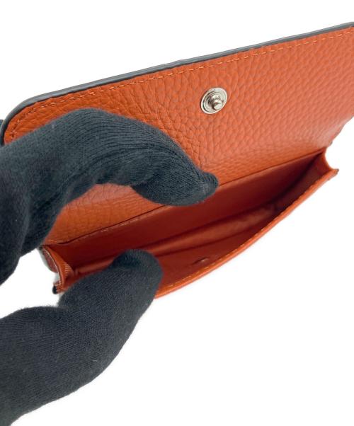 EAR（イア）ear (イア) 2つ折り財布 オレンジ 未使用品の古着・服飾アイテム