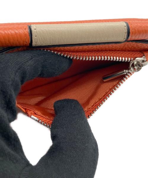 EAR（イア）ear (イア) 2つ折り財布 オレンジ 未使用品の古着・服飾アイテム