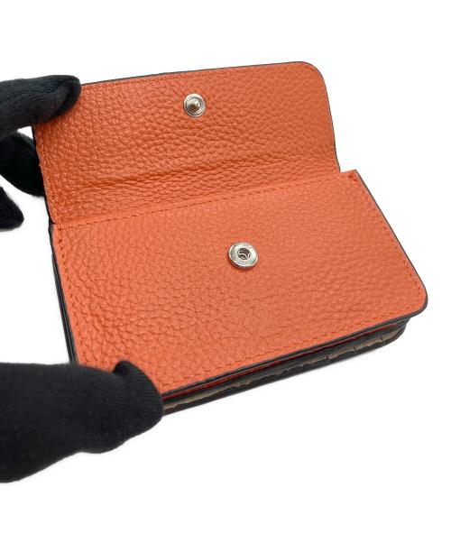 EAR（イア）ear (イア) 2つ折り財布 オレンジ 未使用品の古着・服飾アイテム
