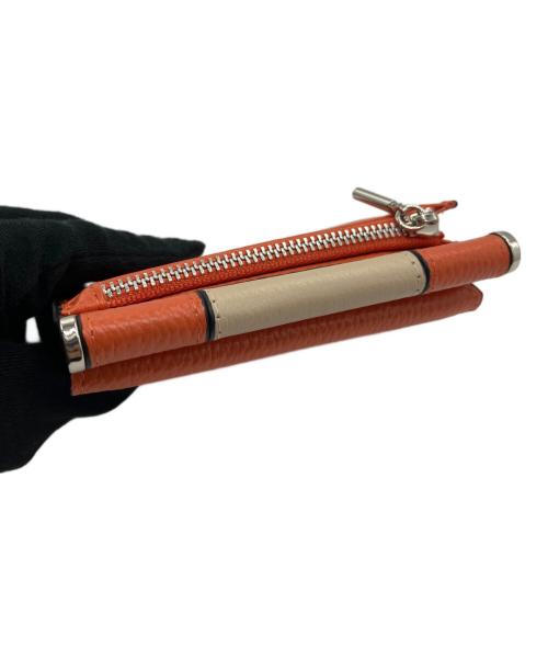 EAR（イア）ear (イア) 2つ折り財布 オレンジ 未使用品の古着・服飾アイテム