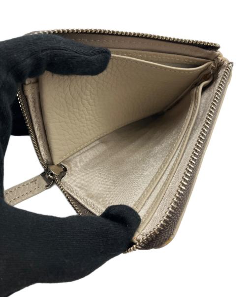 Paul Stuart（ポールスチュアート）Paul Stuart (ポールスチュアート) 財布 クリームの古着・服飾アイテム