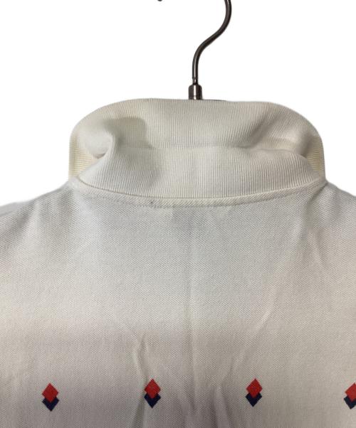 Star OF HOLLYWOOD（スターオブハリウッド）Star OF HOLLYWOOD (スターオブハリウッド) ポロシャツ アイボリー サイズ:記載無しの古着・服飾アイテム