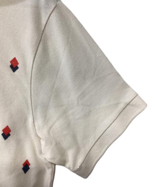 Star OF HOLLYWOOD（スターオブハリウッド）Star OF HOLLYWOOD (スターオブハリウッド) ポロシャツ アイボリー サイズ:記載無しの古着・服飾アイテム