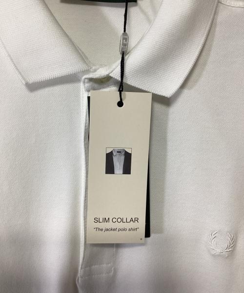 FRED PERRY（フレッドペリー）FRED PERRY (フレッドペリー) ポロシャツ ホワイト サイズ:L 未使用品の古着・服飾アイテム