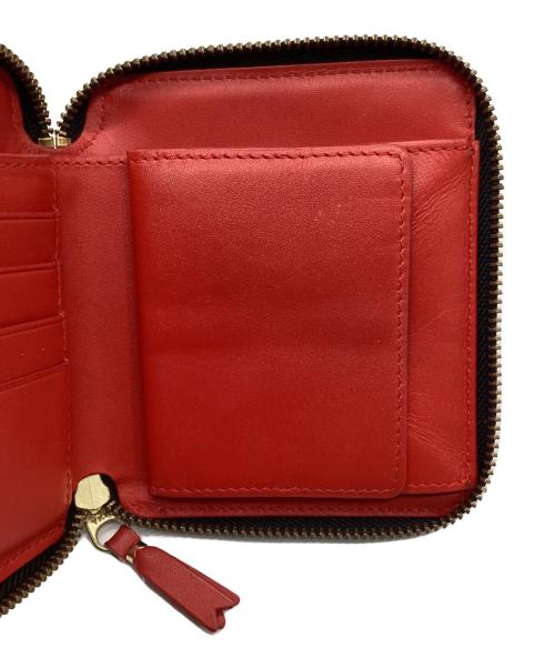 COMME des GARCONS（コムデギャルソン）COMME des GARCONS (コムデギャルソン) ラウンドファスナー財布 レッドの古着・服飾アイテム