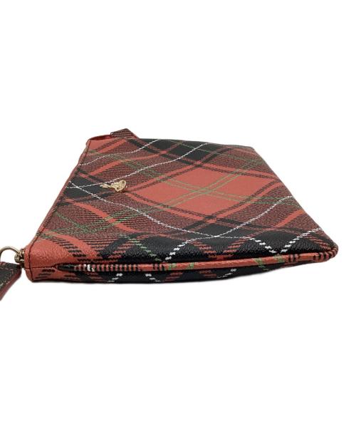 Vivienne Westwood（ヴィヴィアンウエストウッド）Vivienne Westwood (ヴィヴィアンウエストウッド) クラッチバッグ オレンジ×ブラックの古着・服飾アイテム