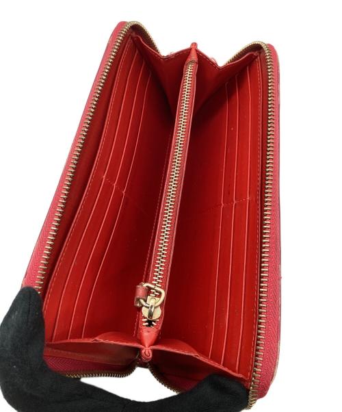 Christian Louboutin（クリスチャン・ルブタン）Christian Louboutin (クリスチャン・ルブタン) ラウンドファスナー長財布 ショッキングピンクの古着・服飾アイテム