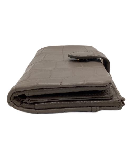 Alumuco（アルムコ）Alumuco (アルムコ) 2つ折り財布 ベージュの古着・服飾アイテム