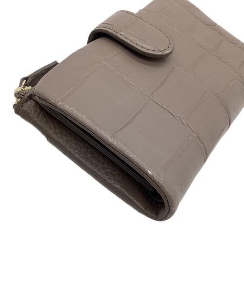 Alumuco（アルムコ）Alumuco (アルムコ) 2つ折り財布 ベージュの古着・服飾アイテム