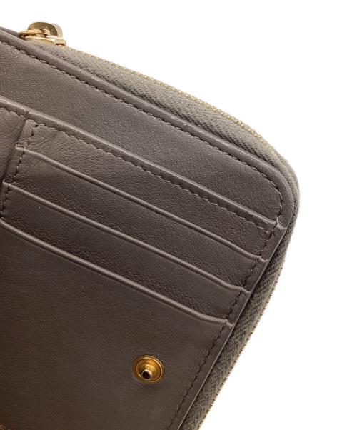 Saint Laurent Paris（サンローランパリ）Saint Laurent Paris (サンローランパリ) コンパクトウォレット グレーの古着・服飾アイテム