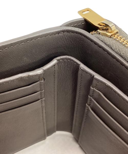 Saint Laurent Paris（サンローランパリ）Saint Laurent Paris (サンローランパリ) コンパクトウォレット グレーの古着・服飾アイテム