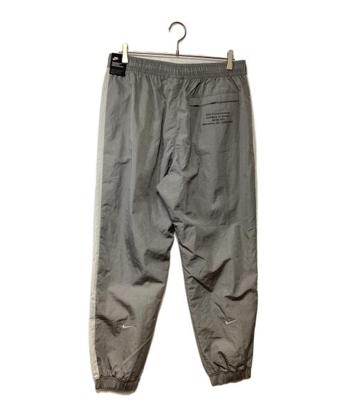 NIKE（ナイキ）NIKE (ナイキ) ナイロンパンツ グレー×ホワイト サイズ:XXL 未使用品の古着・服飾アイテム