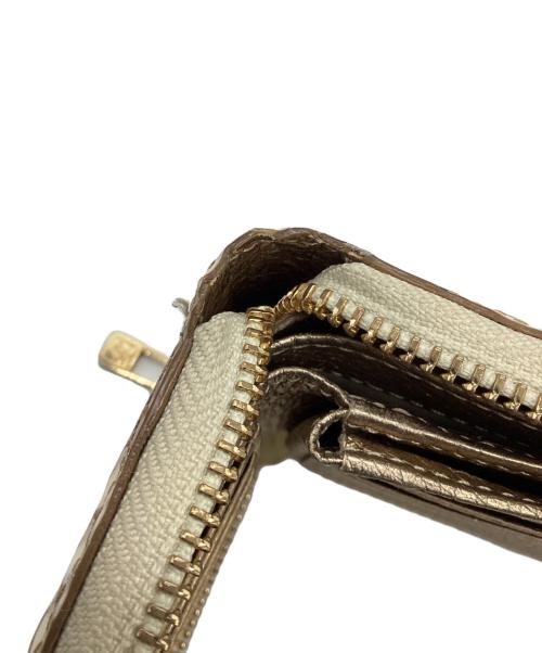 HER SCHEDULE（ハースケジュール）HER SCHEDULE (ハースケジュール) ラウンドジップウォレット ベージュの古着・服飾アイテム