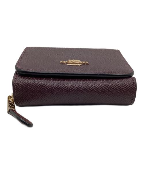 COACH（コーチ）COACH (コーチ) 3つ折り財布 パープルの古着・服飾アイテム