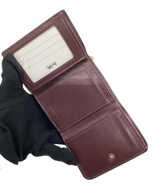 COACH（コーチ）COACH (コーチ) 3つ折り財布 パープルの古着・服飾アイテム