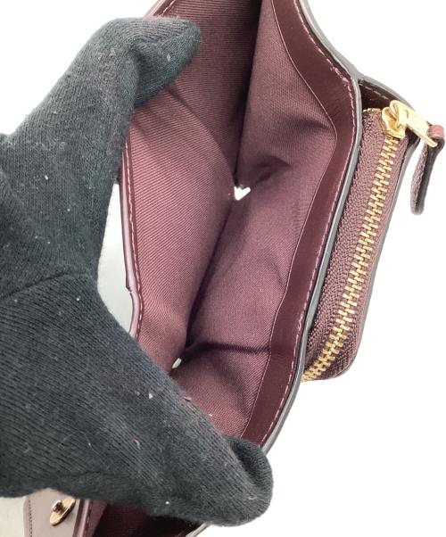 COACH（コーチ）COACH (コーチ) 3つ折り財布 パープルの古着・服飾アイテム