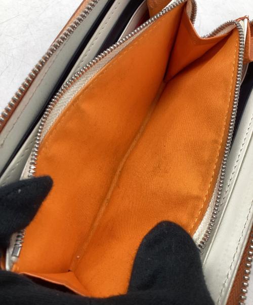 CASTELBAJAC（カステルバジャック）CASTELBAJAC (カステルバジャック) 長財布 オレンジの古着・服飾アイテム