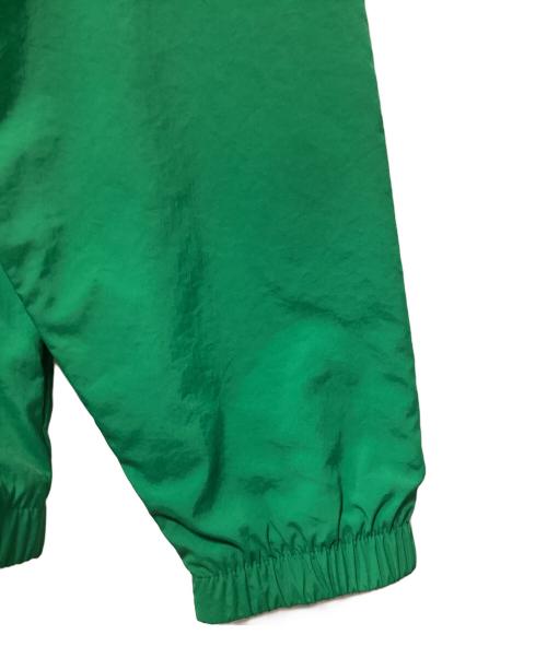 NEW BALANCE（ニューバランス）NEW BALANCE (ニューバランス) アスレチックス ポディウム ウィンドブレーカー ジャケット グリーン×レッド サイズ:L 未使用品の古着・服飾アイテム