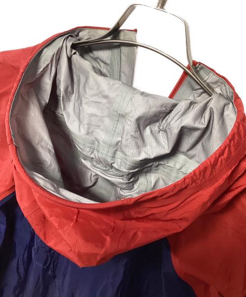 mont-bell（モンベル）mont-bell (モンベル) ナイロンジャケット レッド×ネイビー サイズ:Lの古着・服飾アイテム
